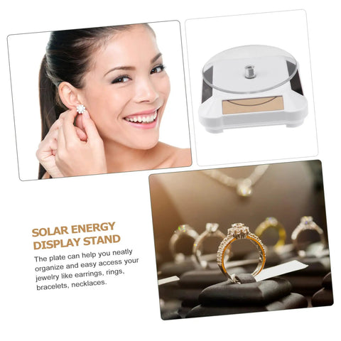 Woman smiling while wearing earrings next to Solar Powered Rotating Display Turntable For Jewelry Phones And Accessories.