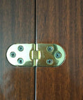 Heavy Duty 180 Degree Folding Table Hinges With Rounded Corners For Kitchen Cabinets And Bedroom Furniture, Gold finish, mounted on wooden surface.
