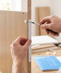 Heavy Duty Drawer Slides With Smooth Glide No Squeak And Easy Installation, White Plastic And Metal Rails For Cabinets, Bins, And Office Files, Quiet Operation, Durable, Modern Storage Hardware For Home Or Office mounted on cabinet panel