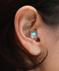 Ear with Smaller Ears Rainbow Earplugs for Concerts and Festivals, high fidelity reusable hearing protection for small ear canals.