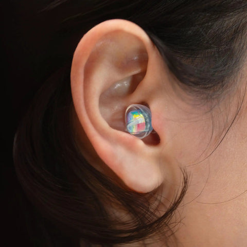 Ear with Smaller Ears Rainbow Earplugs for Concerts and Festivals, high fidelity reusable hearing protection for small ear canals.