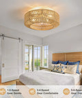 Whisper Quiet Boho Caged Rattan Fandelier Ceiling Fan With Bright Integrated Lighting and remote control in a cozy bedroom setting.