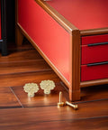 Antique Zinc Alloy Drawer Pulls for Dresser and Cabinets beside a wooden cabinet, floral design visible, with screws
