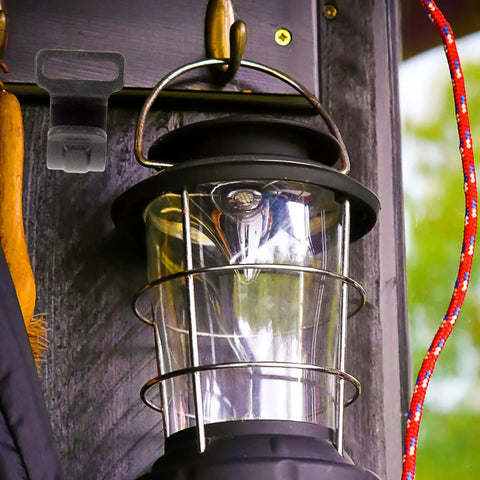 Lantern hanging on hook from Ten Pack Large Plastic Camping Tent Hooks Sturdy Hanging Organizer Hooks for Tent Poles and Outdoor Gear