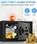 Open compact home safe with alarm system containing cash, jewelry, and gold coins, ideal for dorms and small apartments.