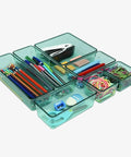 Modular Drawer Organizer Set With Seven Bins In Four Sizes For Office Home Makeup And Kitchen Clear Green Plastic Storage Trays That Keep Your Junk Drawer Tidy And Easy To Find, showing assorted items neatly organized.