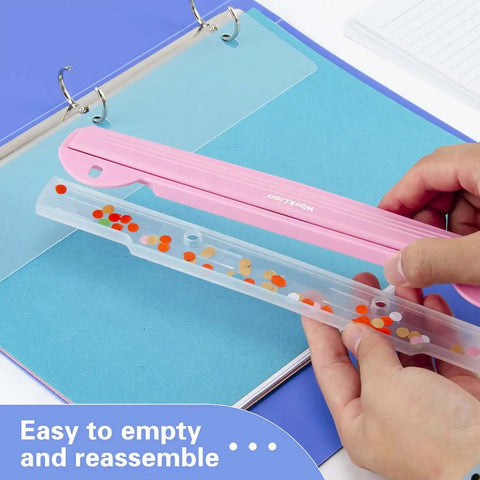 Using the Pink 3 Hole Binder Punch, Compact Desk Tool With 5 Sheet Capacity, showing easy chip tray removal for office organization.