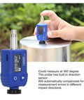 Super Portable Digital Hardness Tester Rockin Tungsten Carbide Probe And Clever Dual Coil Setup measuring on metal surface outdoors.
