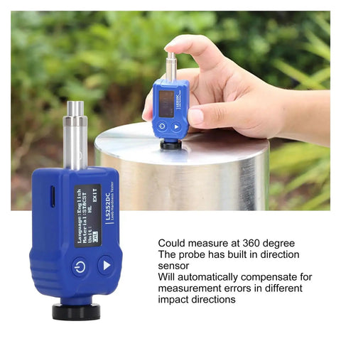 Super Portable Digital Hardness Tester Rockin Tungsten Carbide Probe And Clever Dual Coil Setup measuring on metal surface outdoors.