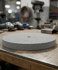 10 Inch Nylon Fiber Deburring Wheel for Grinders and Buffing Machines, 180 Grit Cup Abrasive Disk, 16mm Arbor on a workbench