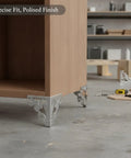 5.9 Inch S Shaped Carbon Steel Furniture Leg In Chrome Finish For Cabinets And Vanities attached to a wooden cabinet.