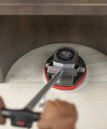 Multi Purpose Commercial Orbital Floor Cleaner For Hard Floors And Carpets in use under furniture, gray and red design
