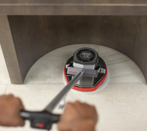Multi Purpose Commercial Orbital Floor Cleaner For Hard Floors And Carpets in use under furniture, gray and red design