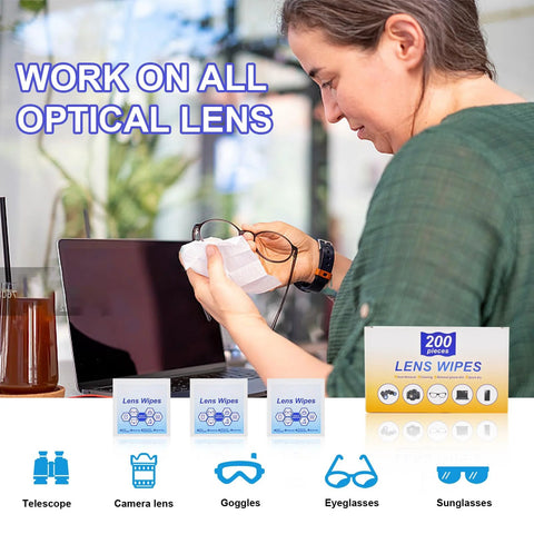 Front view of a person cleaning eyeglasses with Lens Wipes; 200-piece box shown on desk