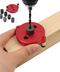 Self Centering Dowel Jig With Swap In Bushings For Knockout Precision Portable Guide Tool helping to drill straight holes into wood.