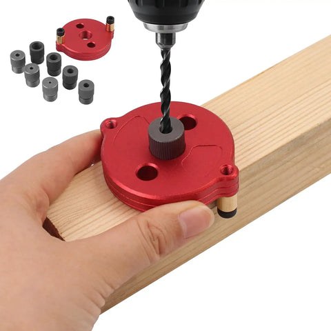 Self Centering Dowel Jig With Swap In Bushings For Knockout Precision Portable Guide Tool helping to drill straight holes into wood.