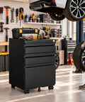 Rock Solid Heavy Duty Metal Rolling Tool Cabinet With Lockable Drawers And Non Slip Rolling Wheels in garage with tools.