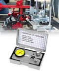 QWORK dial test indicator kit with yellow dial gauge in open gray case on metal workbench