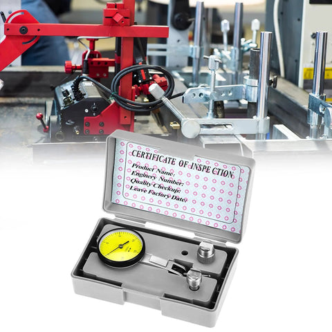 QWORK dial test indicator kit with yellow dial gauge in open gray case on metal workbench