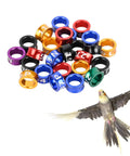 Dope Multicolor Aluminum Bird Leg Rings Pack For Training And Identification, assorted colors and numbers next to a flying bird