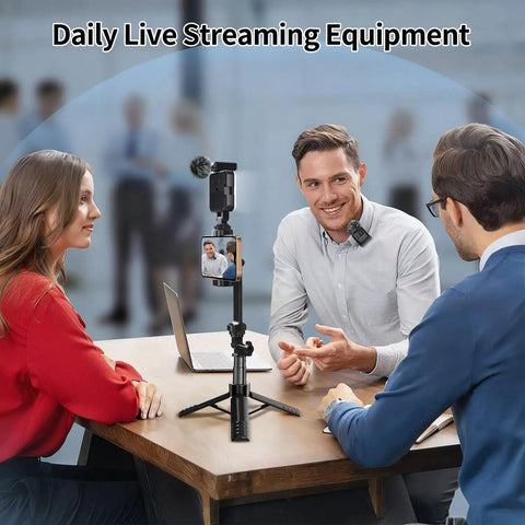 Vlogging Kit for iPhone and Android, 31 Inch Selfie Stick Tripod With LED Light, Microphone, Remote, displayed on desk during meeting