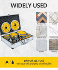 Front view: Diamond tile hole saw kit, 15-piece, in metal case with yellow rims; includes finger and chamfer bits.