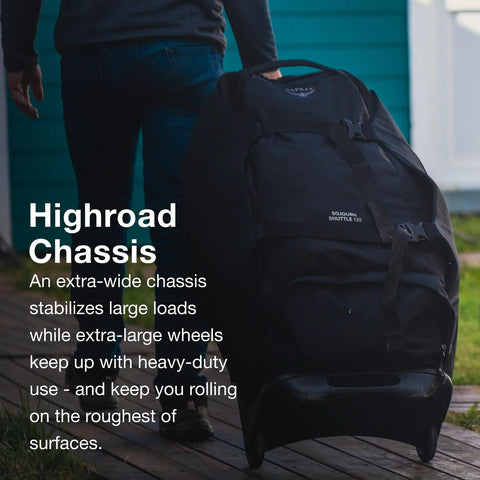 Front-side view of black Osprey Sojourn Shuttle 30/100L wheeled duffel with oversized wheels