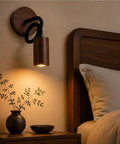 Adjustable Gooseneck Wall Sconce, Modern Wood Grain Wall Lamp mounted beside a bed with a wooden headboard and nightstand.