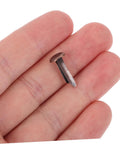 Close-up of a brown miniature metal brad from 50 Pack Miniature Metal Fasteners and Close Pins for Scrapbooking Card Making and Craft DIY Brads Paper Fasteners for Arts and Crafts Projects and Creative Kid Friendly Activities Easy to Use.