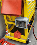 Reliable Serious Juice 55 Amp 120V To 12V DC Power Converter With Built In Three Stage Smart Battery Charger attached to tool cart.