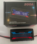 Badass No Sweat Plug And Play 200A Digital Wattmeter with box shows volts, amps, and watts for solar and vehicle setups.