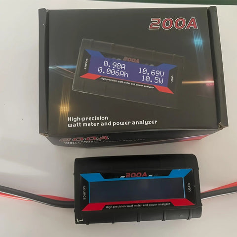 Badass No Sweat Plug And Play 200A Digital Wattmeter with box shows volts, amps, and watts for solar and vehicle setups.