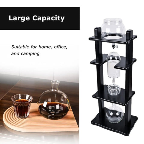 Large Capacity Cold Brew Coffee Maker Tower With 1000ml Vertical Glass Carafe And Solid Wood Stand on a countertop with beverage.