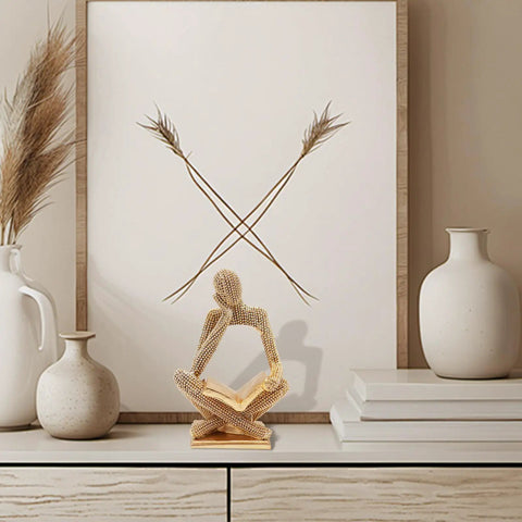Sparkling Gold Tone Reading Woman Statue With Beaded Surface Modern Abstract Figurine for home decor on shelf with vases