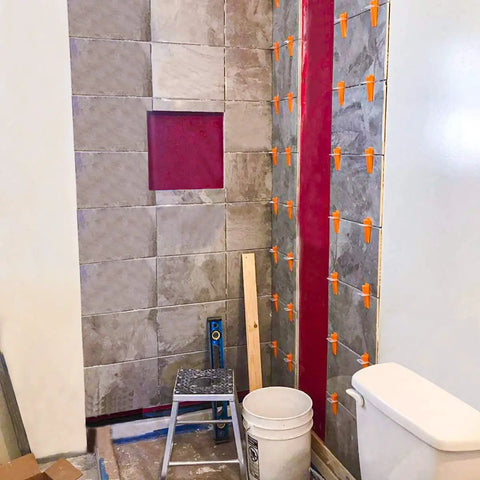 Bathroom wall tiling with 1000 Tile Leveling Clips For DIY Ceramic Tile And Stone Installations, Leveling Spacers For Floor And Wall Tiles.