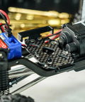 Close-up of 39g LCG Carbon Fiber Chassis Frame Kit With 6g Battery Tray For 1 18 TRX4M Defender Bronco K10 F150 RC Crawler Upgrade.