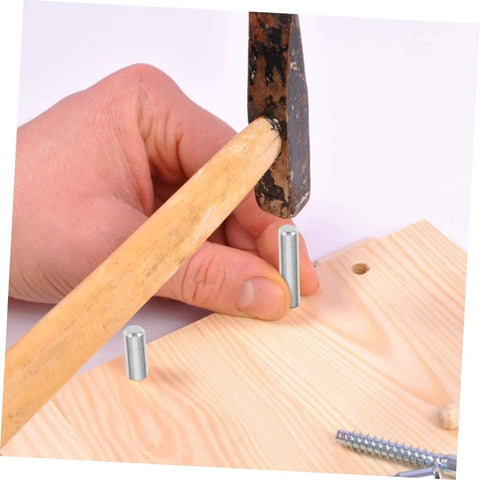 Stainless Steel Dowel Pins Set Of 100 Pro Grade Precision Positioning For Machinery Electronics And Automotive Projects Smooth Surface Reduces Wear Easy Install And Quick Alignment Pin Fasteners For Reliable Heavy Duty Holds being installed in wood with a hammer