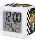 Solid Build Cube Digital Alarm Clock With Seven Color Led Night Light And Easy Peasy Snooze displaying time and temperature.