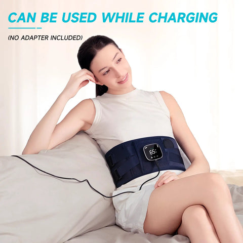 Woman using Cordless Back Relief Heating Pad With Built In Massager And Wearable Lumbar Support, plugged in and charging