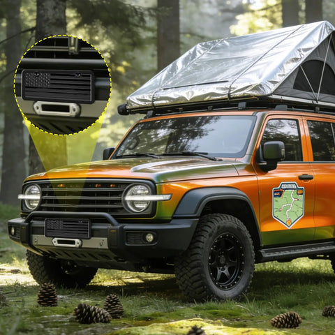 SUV with Flag 6x12 Inch Aluminum License Plate Frame With Thick 3D Embossed Metal Tag, black anodized, in forest.