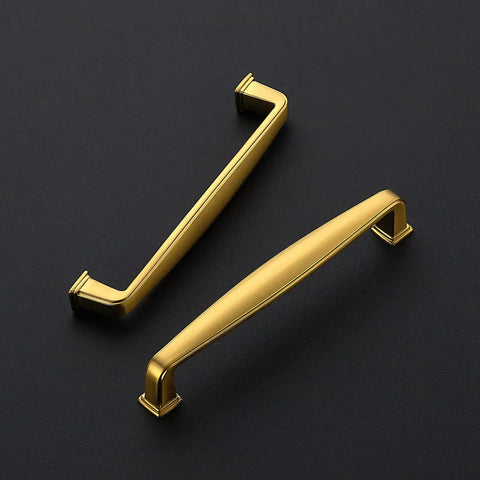 A Must Have Hella Sturdy Brushed Brass Cabinet Handles And Pulls With 5 Inch Center To Center Spacing For Kitchens And Drawers Features A Clean Look And Comes In A 30 Pack Bulk Set, showcasing two designs.