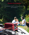 Heavy Duty 2000W Power Inverter DC To AC Converter With 3 AC Outlets Car Battery Charger displayed outdoors during camping.