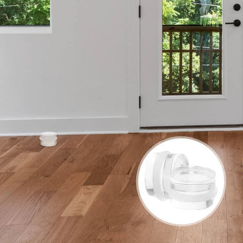 Two Pack Silicone Door Stopper Wedges To Prevent Finger Injuries And Door Slams placed on hardwood floor near door