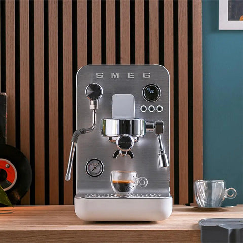 Front view of Semi Pro Home Espresso Machine With 15 Bar Pump Triple Thermoblock Heating 58mm Portafilter Steam Wand And Made In Italy Craftsmanship In White For True Barista Quality At Home on counter.