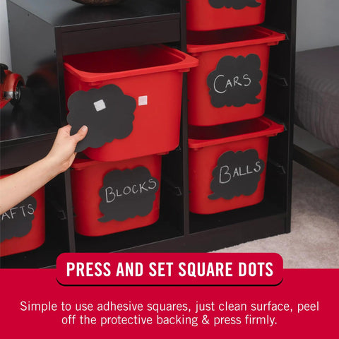 Sticky Back Fasteners With Removable Adhesive 0.88 In By 0.88 In White 12 Count on red storage bins labeled Blocks, Cars, Balls.