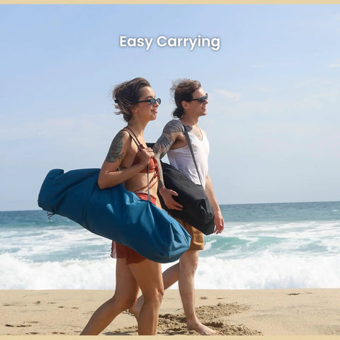 People carrying Foldable Hammock Style Camp Chair With Detachable Footrest And Padded Headrest And Seat for beach camping on sand.