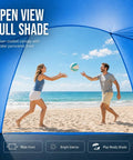 Couple playing with a ball under Portable Beach Sun Shelter For 2 To 8 People, UPF 50 Plus UV Protection at the beach