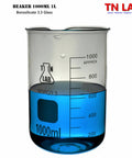 1L Borosilicate Glass Beaker With Graduations 1000ml filled with blue liquid, close-up view of measurements and logo