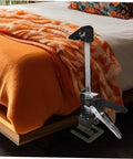 Heavy Duty Hand Lifting Tool Jack 2 Piece Set Multi Function Tile Installer positioned beside a bed with orange blanket.