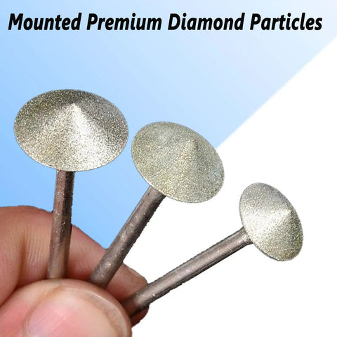 Close-up of Umbrella Shape Diamond Burr Set For Rotary Tools, 7 Pc 240 Grit With One Eighth Inch Shank held in hand